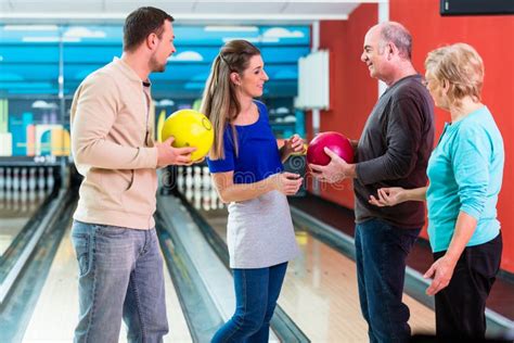 Family Enjoying Indoor Games Stock Photo - Image of couple, enjoying ...