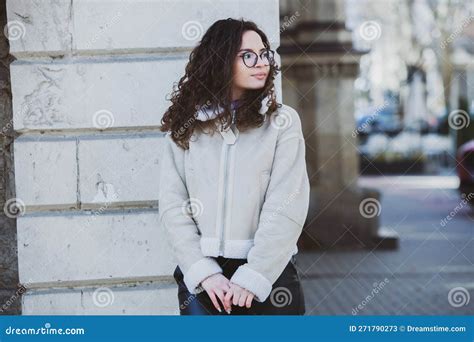 Beautiful Young Woman With Brunette Curly Hair Portrait In Eye Glasses