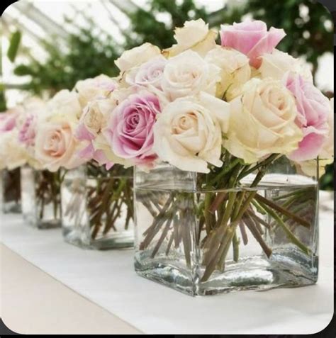 Simple Wedding Centerpieces with Pink and White Roses