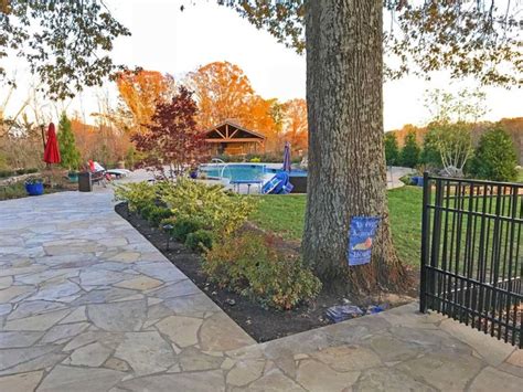 Completed After Photo Of Backyard With Flagstone Patio Pool Deck