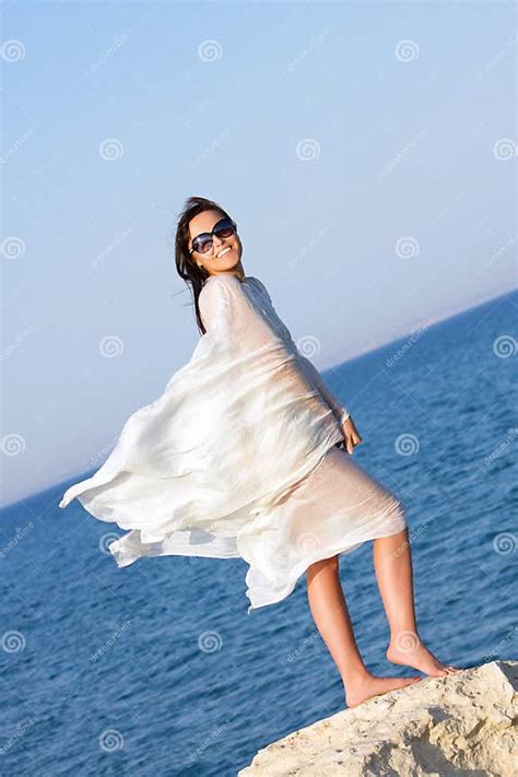 Girl In White Sarong Standing On The Beach Stock Photo Image Of