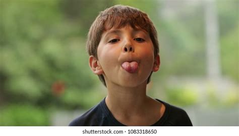 Young Child Sticking Tongue Out Misbehaving Stock Photo 1083318650 | Shutterstock