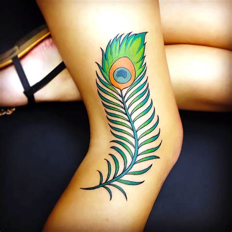 Simple Peacock Feather Tattoo Idea