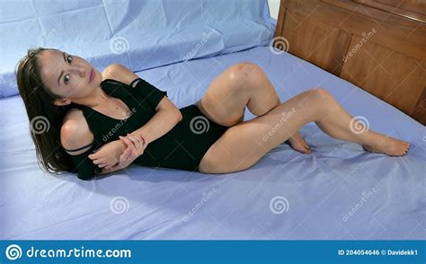 Model Posing In Bed In Black Lingerie Stock Photo Image Of Beautiful Caucasian