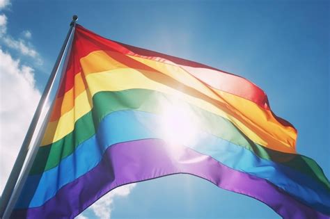 Bandeira gay lgbt arco íris generativa ai contra um céu azul Foto Premium
