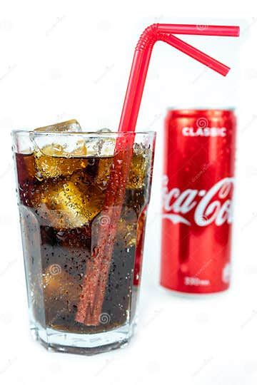 Glass Of Cold Refreshing Coca Cola Soda With Ice Metal Can Of Coca