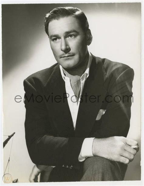 Errol Flynn 725x925 Still 1940s Seated Smoking Studio Portrait By