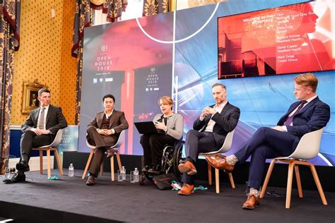 Panel Discussion On Stage For A Conference In The Waterloo Room