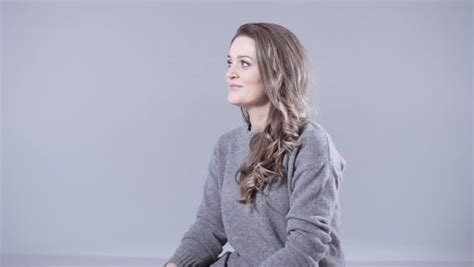 Blonde Girl With Wavy Hair In Black Jacket Against The Background Of Mountains Beautiful Sexy