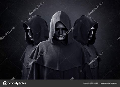 Black Cloaked Figure With Hood