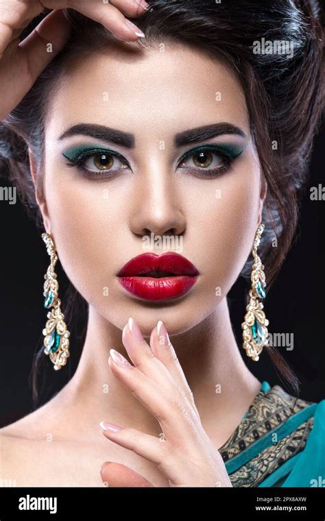 Beautiful Brunette Girl With Arabic Evening Make Up And Perfect Skin Beauty Face Close Up