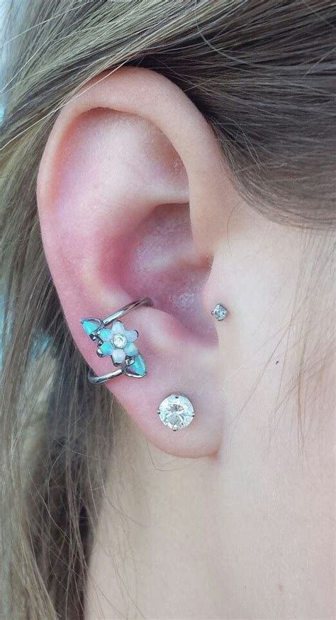 Upgraded A Conch Piercing To This Awesome Spiral With A Sky Blue Opal