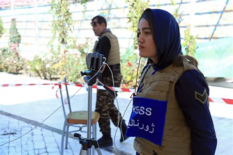 An Afghan Journalist Wearing Safety Equipment While Covering The