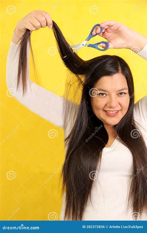 Year Old Latina Woman With Very Long Straight Hair Wants To Cut Her Hair With Scissors Stock