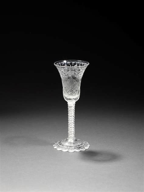 Bonhams An Unusual And Rare Engraved Opaque Twist Wine Glass Circa 1770