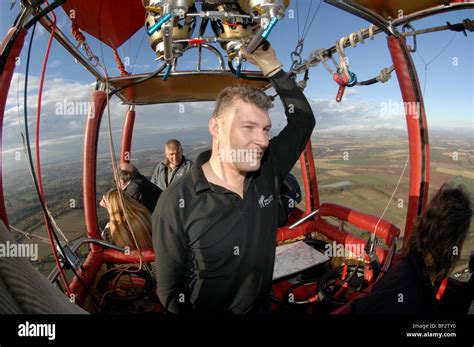 Hot Air Balloon Pilot Flies Hot Air Balloon Over Perthshire Stock Photo Alamy