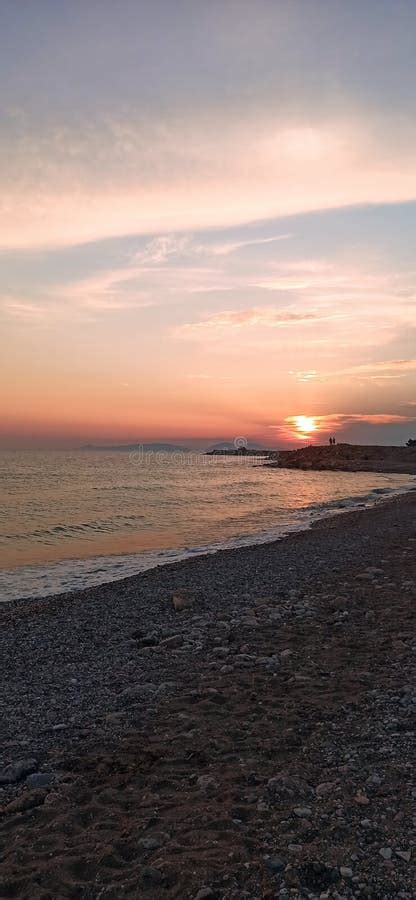 Glyfada beach in Greece stock photo. Image of sunset - 247834800