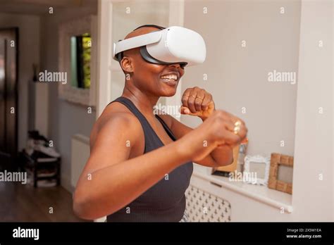 Mature Woman Practicing Boxing With Virtual Reality Simulator Stock Photo Alamy