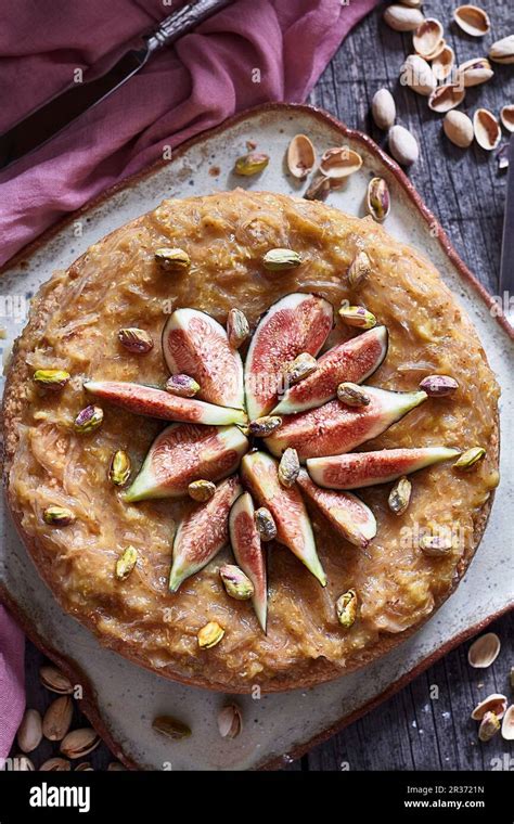 Vegan Cheesecake With Figs And Pistachios Stock Photo Alamy