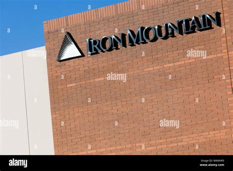 A Logo Sign Outside Of A Facility Occupied By Iron Mountain In Phoenix