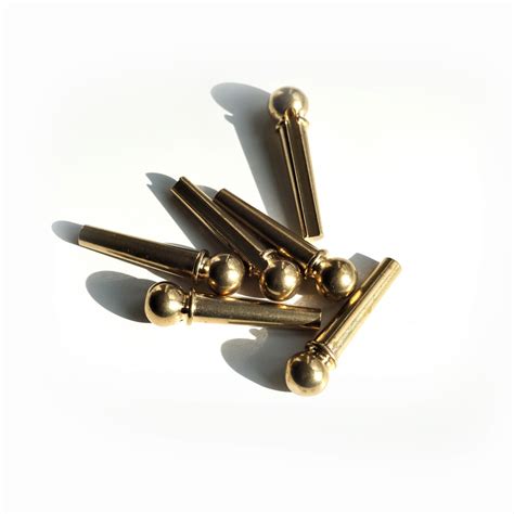 Vintage Brass Acoustic Guitar Bridge Pins | Guitar Anatomy