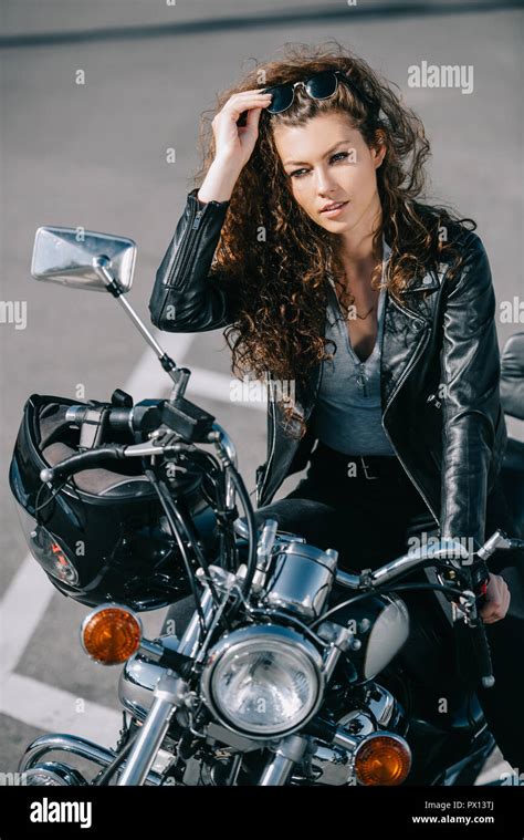 Beautiful Woman Sitting On Motorcycle With Helmet Stock Photo Alamy