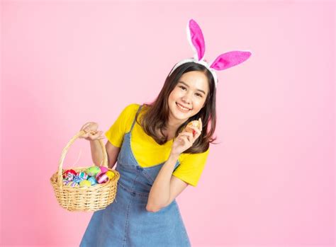 Premium Photo Asian Woman Wear Bunny Ear Hold Easter Eggs Basket