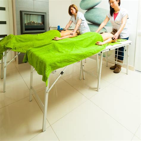 Massage With Hot Rocks Stones In Beautician Stock Photo Image Of Bliss Treatment