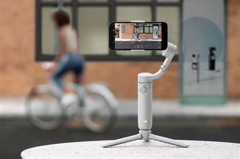 New Dji Om 5 Gimbal Has A Built In Selfie Stick