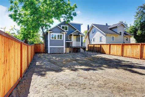 Empty Backyard Ground Ready For Design Blue Siding Trim House Stock