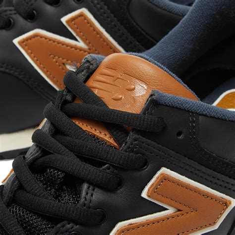 New Balance ML574OMD Black & Tan | END. (IE)