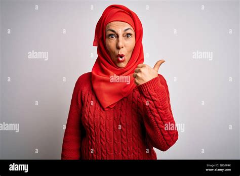 Middle Age Brunette Woman Wearing Muslim Traditional Hijab Over Isolated White Background
