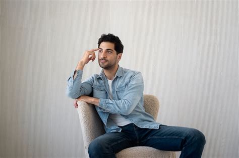 Premium Photo Front View Man Sitting On Chair