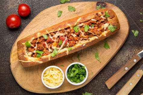 Baguette Stuffed With Bolognese Ragout Of Minced Beef Tomatoes And