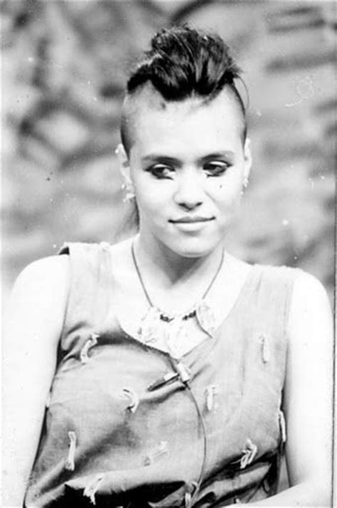 An Old Black And White Photo Of A Woman