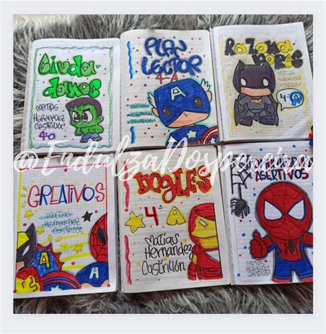 Four Handmade Notebooks With Cartoon Characters On Them All Lined Up