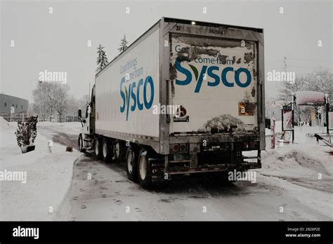 Sysco Food Delivery Truck Semi Trailer Delivering On A Very Snowy