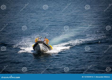 Rescue Marine Vessel during a Rescue Operation at Sea. a Motor Boat ...