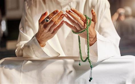 Premium Photo Hands Prayer Beads And Muslim Man Praying In Mosque