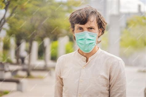 Premium Photo Men Wearing Facial Hygienic Mask For Safety Outdoor