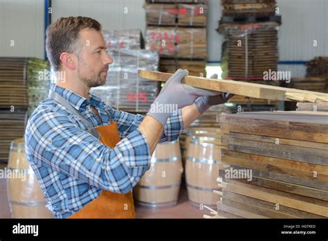 checking the wood delivery Stock Photo - Alamy