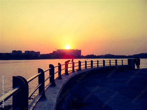 Powai lake sunset in mumbai Stock Photo | Adobe Stock