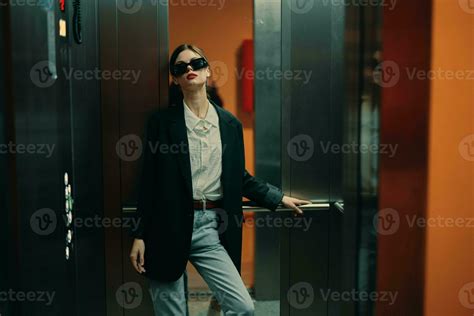 Stylish Woman In Black Jacket And Sunglasses Posing In Elevator Fashion Model Dark Cinematic