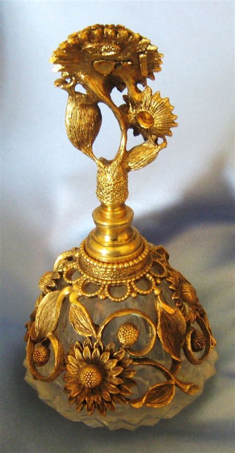 Vintage Ormolu Sun Flowers Perfume Bottle With Amber Tone Glass Jewels