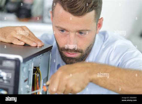 Man Fixing An Old Desktop Computer Stock Photo Alamy