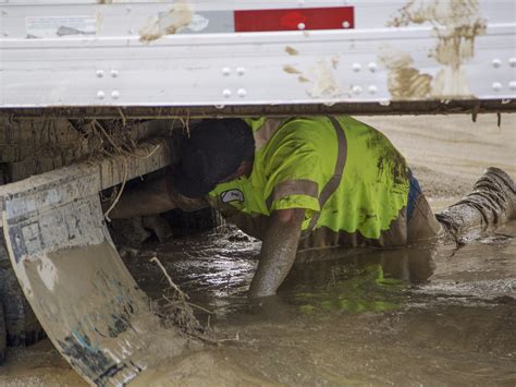 Dozens Of Vehicles Are Still Stuck In The Mud After Flooding In