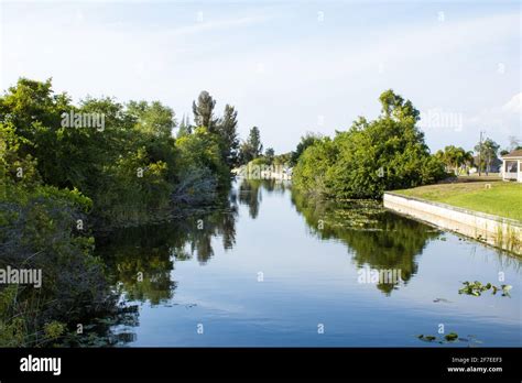 Canal in Cape Coral, Florida 3 Stock Photo - Alamy