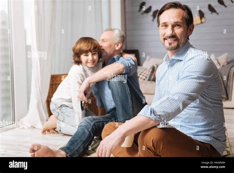 Handsome bearded man smiling Stock Photo - Alamy