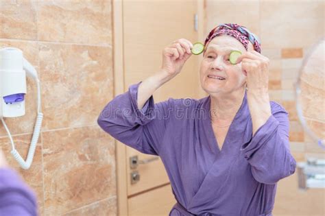 Mature Woman Taking Care Of Her Face Stock Image Image Of Cosmetic Care
