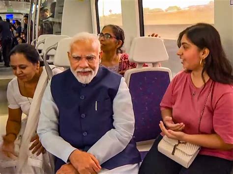 Pm Modi Rides Delhi Metro On His 73rd Birthday Passengers Wish Him In Their Own Ways See Pics